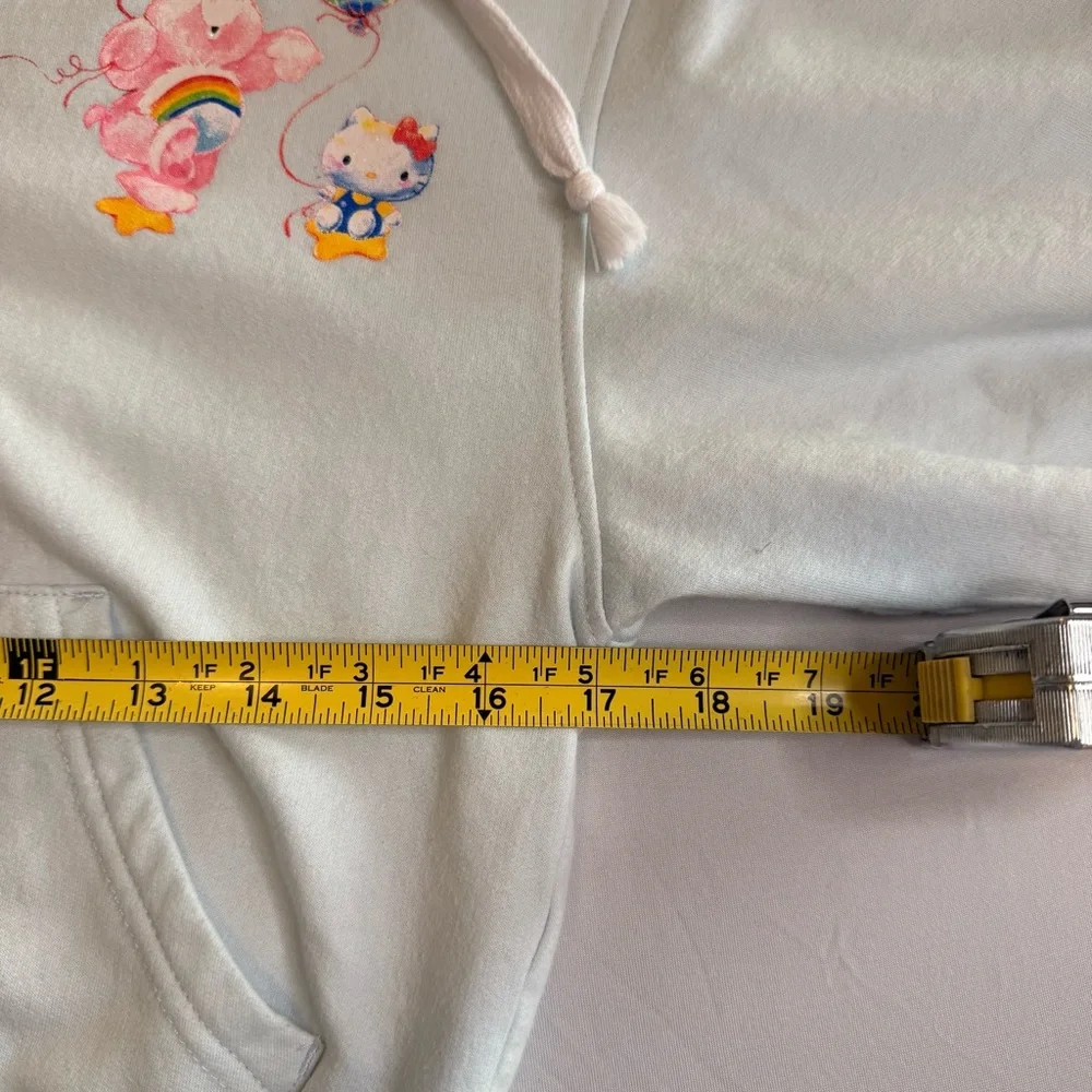 Hello Kitty x Care‎ Bear Collab Hoodie in Light Blue Pride. Junior XS